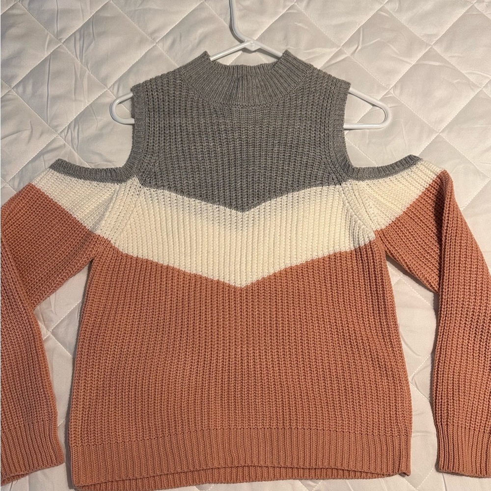 NEW without tags, multi color sweater, open on shoulders, size M.